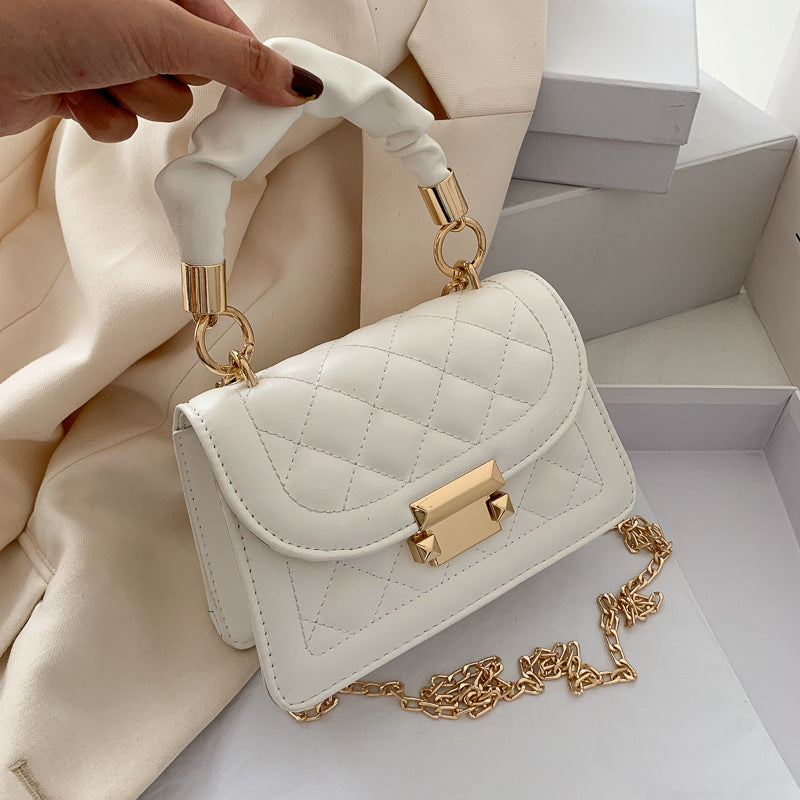 Women's Small Quilted Bag with Lock Closure