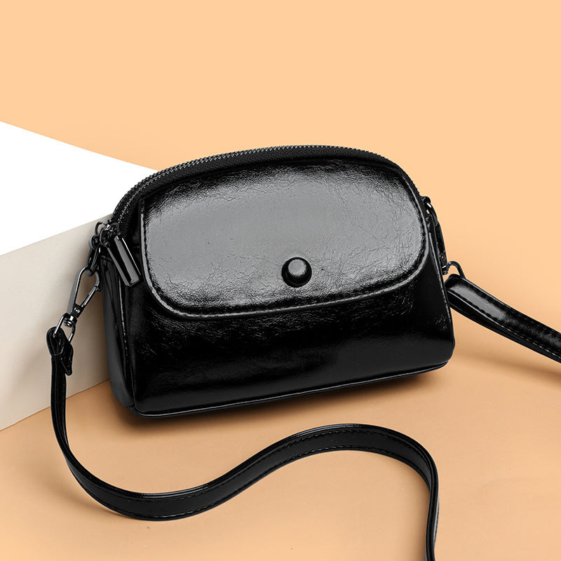 Women's Small Shell Crossbody Bag with Metal Detail and Zipper Closure