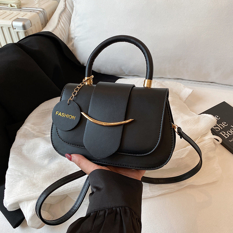 Women's Small Saddle Bag with Magnetic Closure