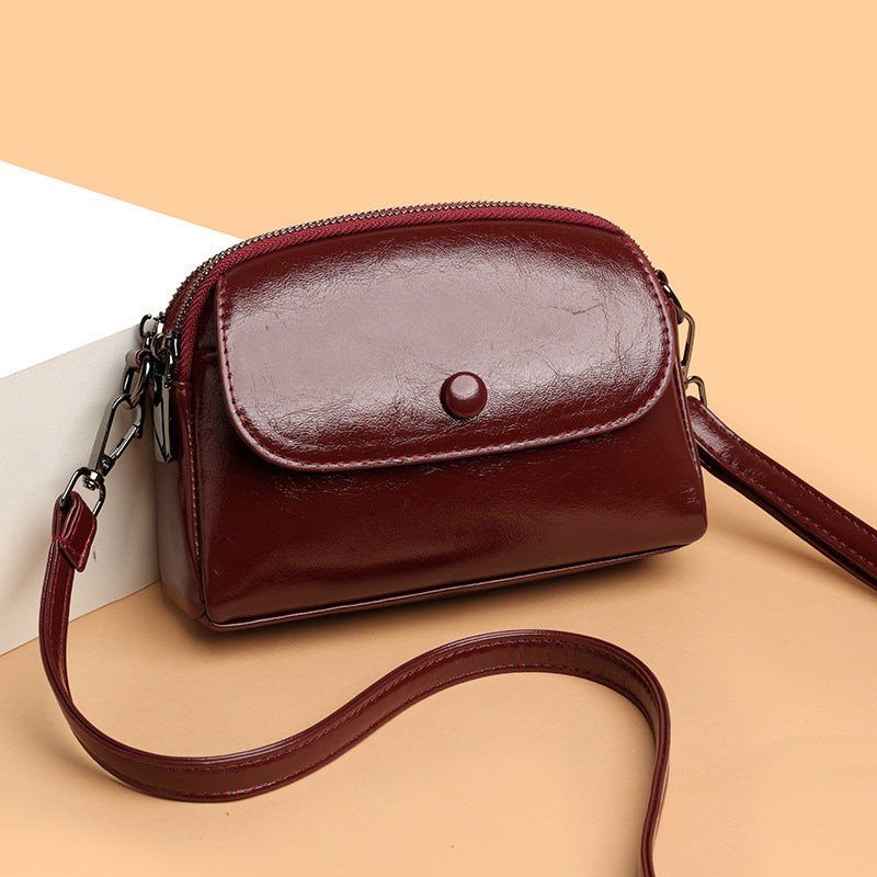 Women's Small Shell Crossbody Bag with Metal Detail and Zipper Closure