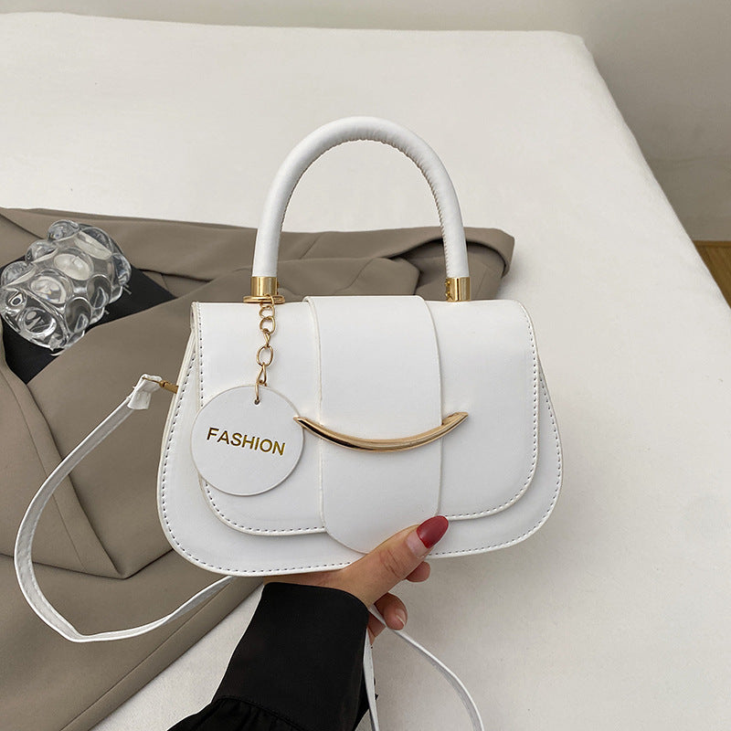 Women's Small Saddle Bag with Magnetic Closure