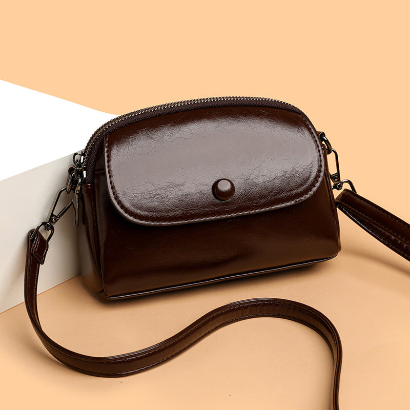 Women's Small Shell Crossbody Bag with Metal Detail and Zipper Closure