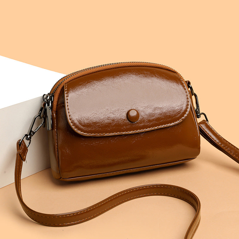 Women's Small Shell Crossbody Bag with Metal Detail and Zipper Closure