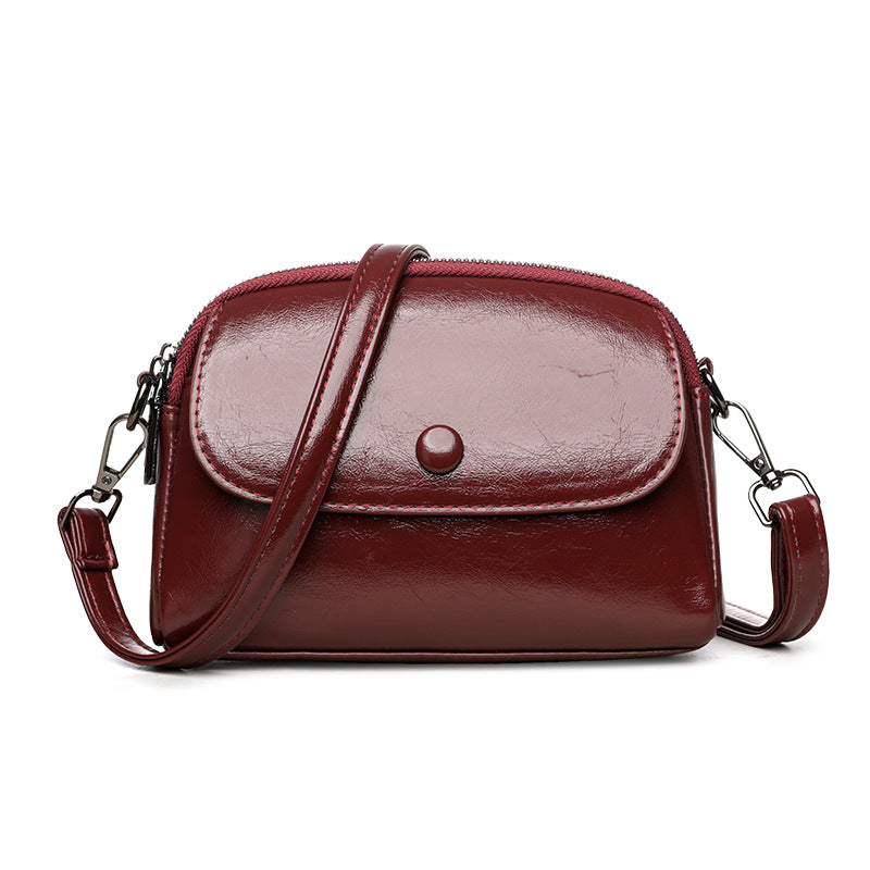 Women's Small Shell Crossbody Bag with Metal Detail and Zipper Closure